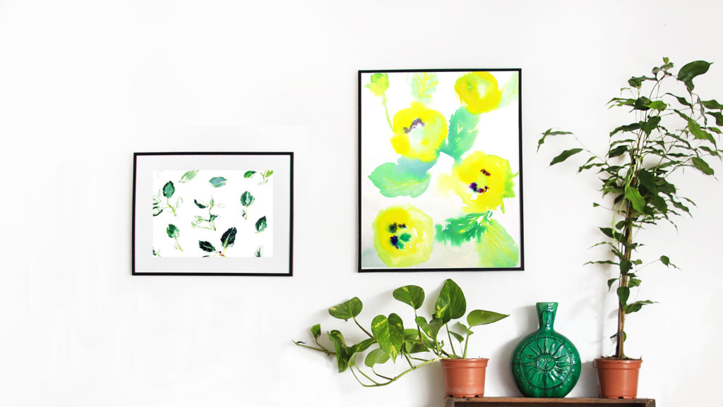 The two framed watercolor drawings by Mari Aoki on the wall.